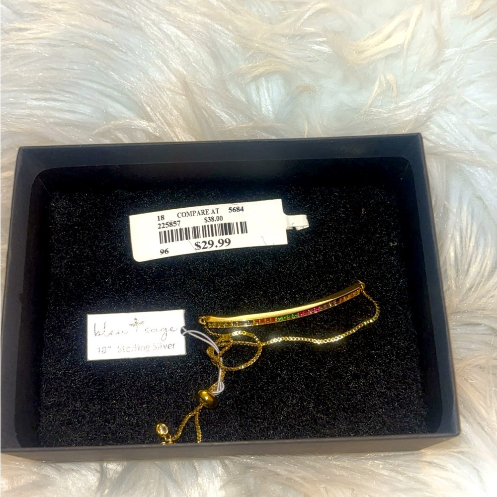 Brand new with tags Sterling silver cute bracelet with extender. Multicolors